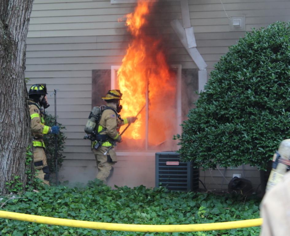 Town home window on fire
