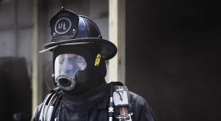 Firefighter wearing PPE mask