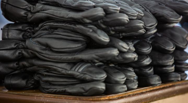 Stack of black firefighting gloves