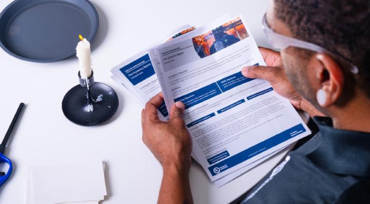 Training officer using one of the Hands-On Training Toolkits on the Fire Safety Academy Resource Library to improve firefighter training.