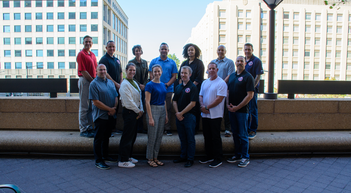 Training Advisory Committee members gathered for a group photo during the Washington, D.C. meeting