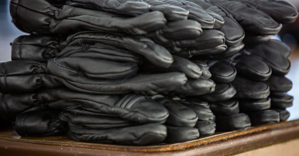 Stack of black firefighting gloves