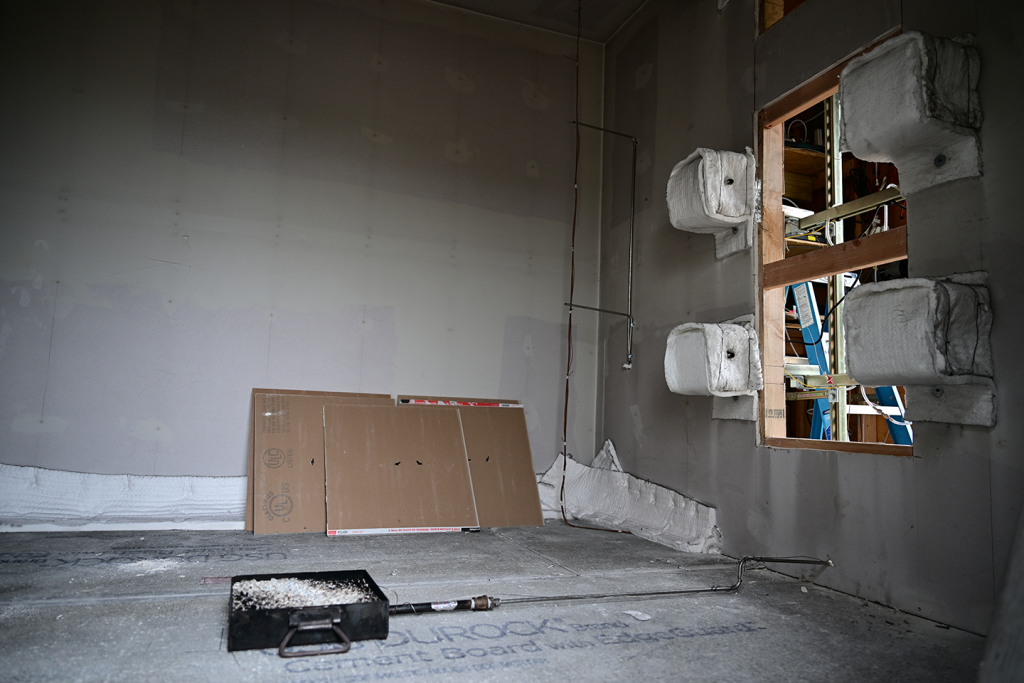 The image shows the compartment set up to measure gravimetric soot mass and soot particle size for the research project, fire modeling development and validation