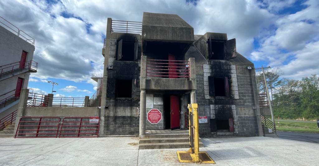 Exterior view of the burn building used for firefighting training, where fire experiments were conducted to study fire behavior and thermal conditions