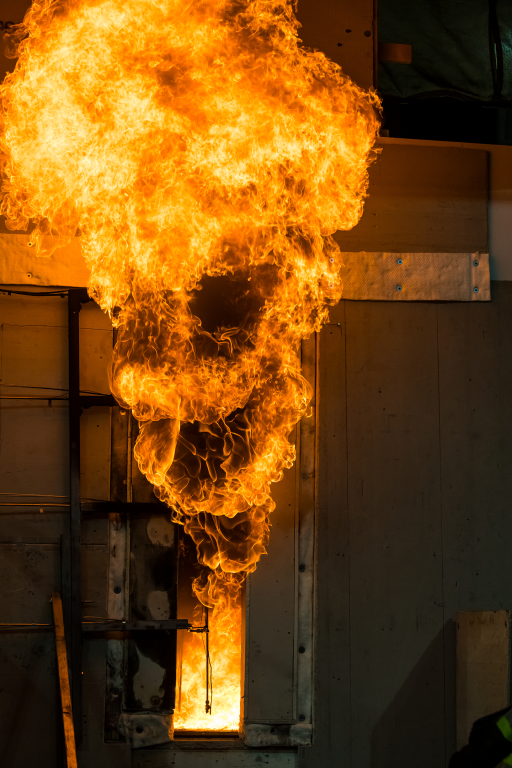 Detailed shot of the left room in the double-room compartment as it reaches flashover