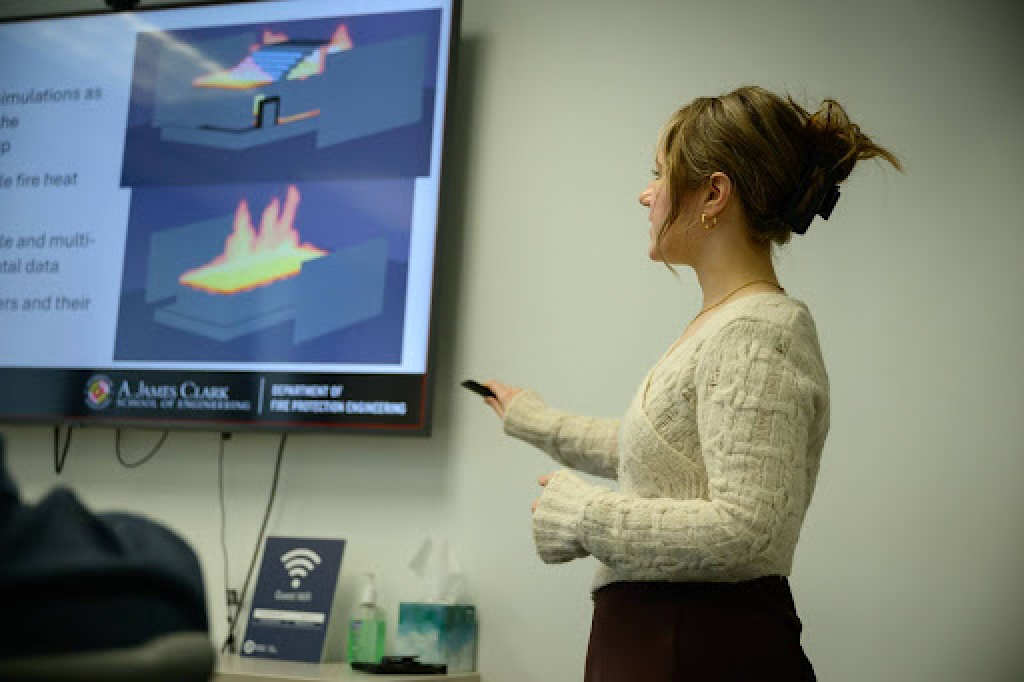 Olivita Hunt explaining electric vehicle fire modeling on screen