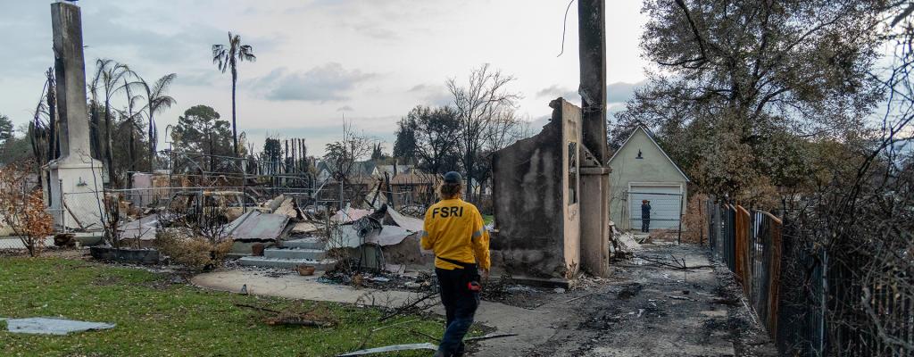 FSRI researcher observing the aftermath of the Eaton fire