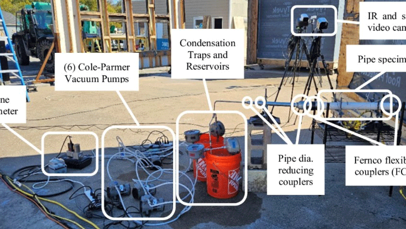The experiment setup is shown, including pipes, vacuum pumps, meters, and cameras