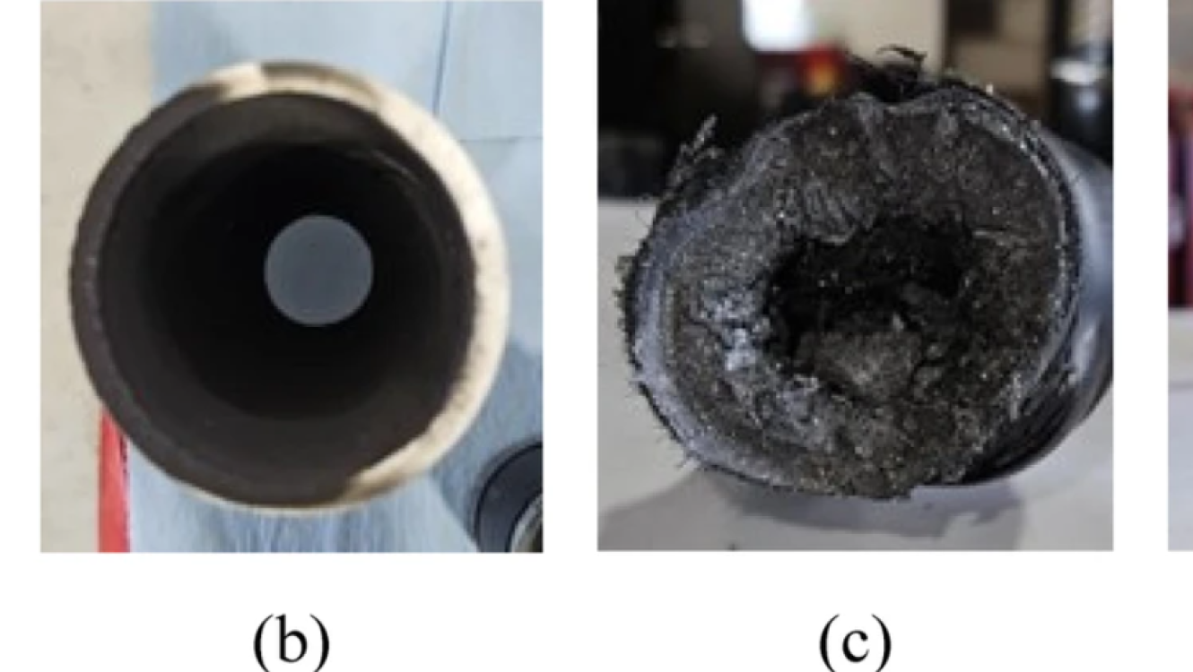 Four sample pipe cross sections show black particulate matter deposition on the inner surface of the pipes