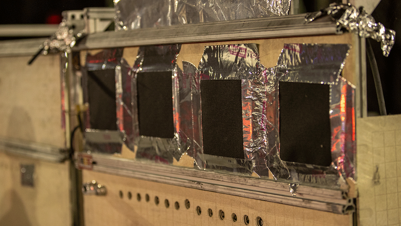 four PPE swatch samples for electric vehicle fire experimental setup