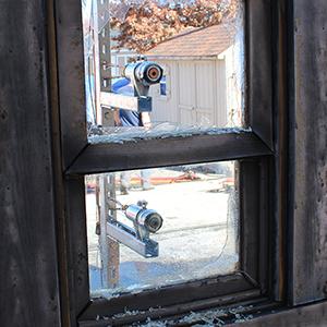 Post-experiment window pane damage during WUI heat transfer testing