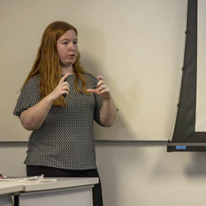 Close-up of Rebekah Schrader speaking in a classroom