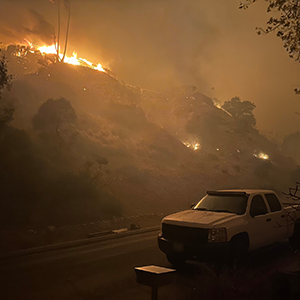 Wildfires approach the built environment, igniting vehicles